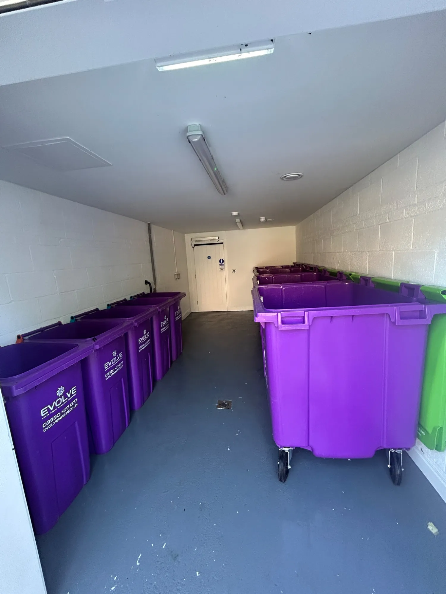 Finished bin store deep clean in Rickmansworth with clean bins and a clean floor